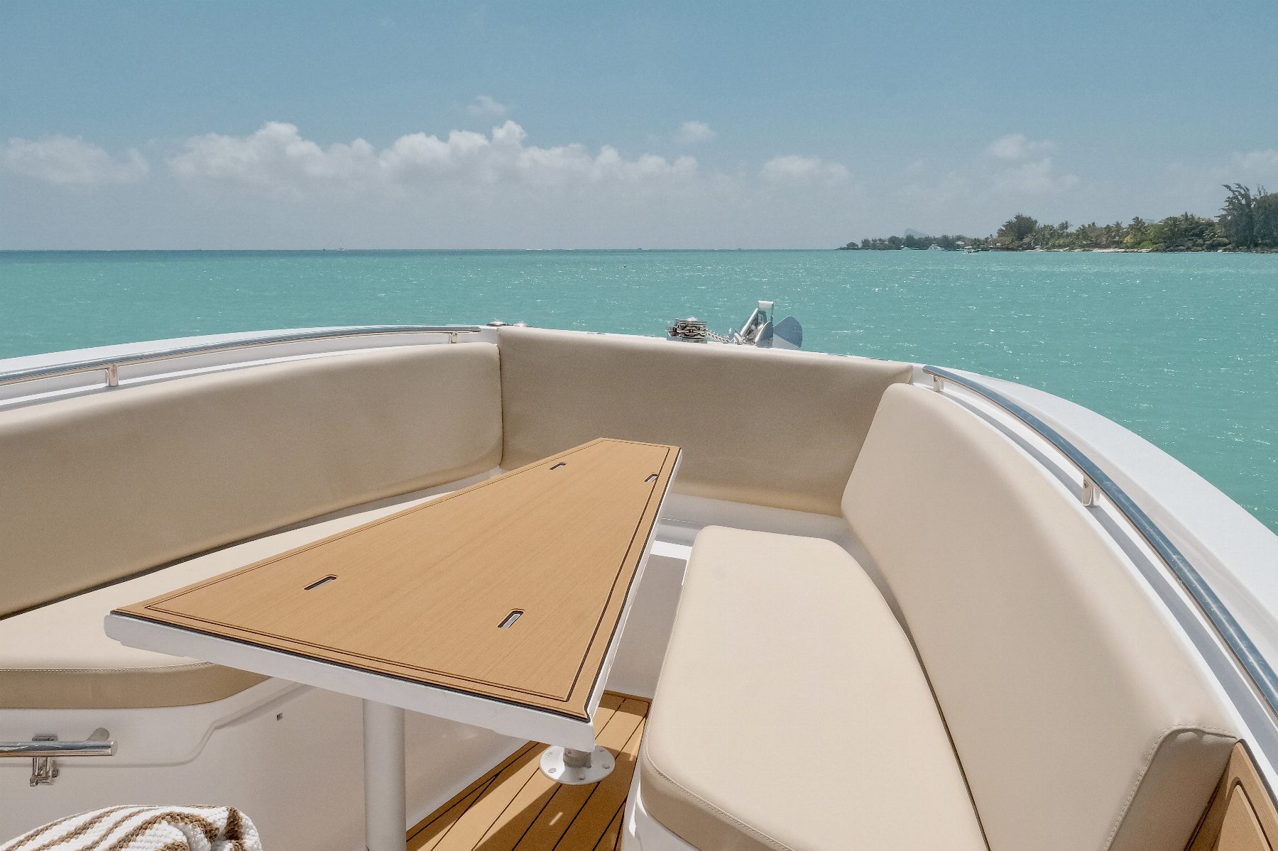 Exterior deck of a Imersea yacht overlooking the Mauritian lagoon